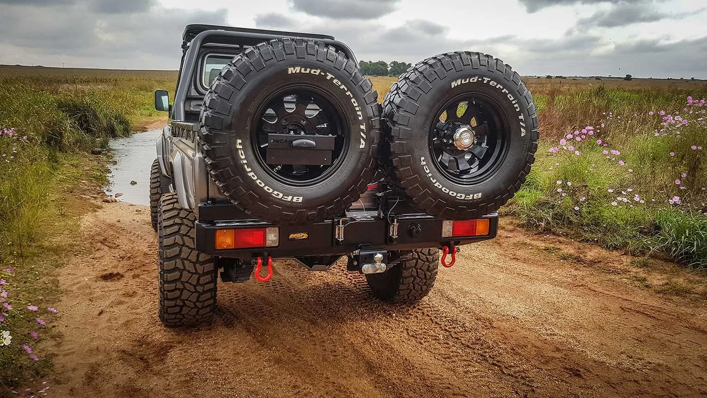 Rear spare-wheel carrying system for an expedition 4x4