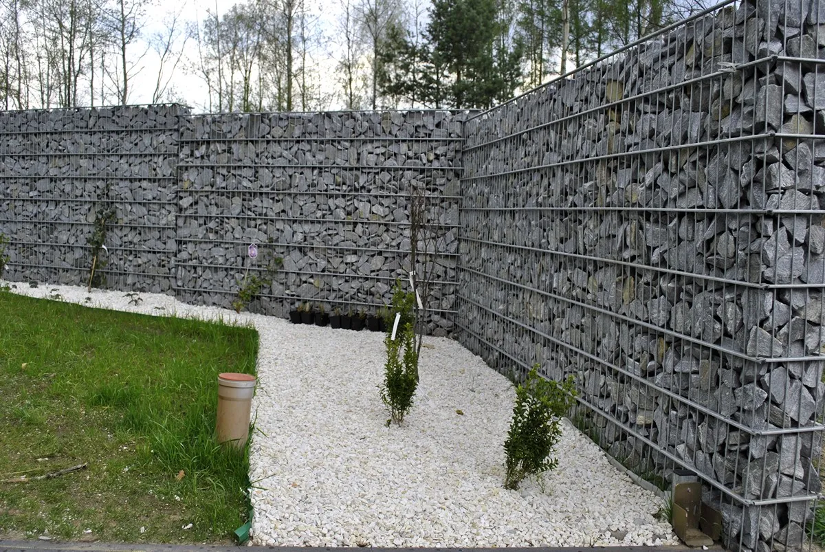 Gabion privacy walls around landscaped garden
