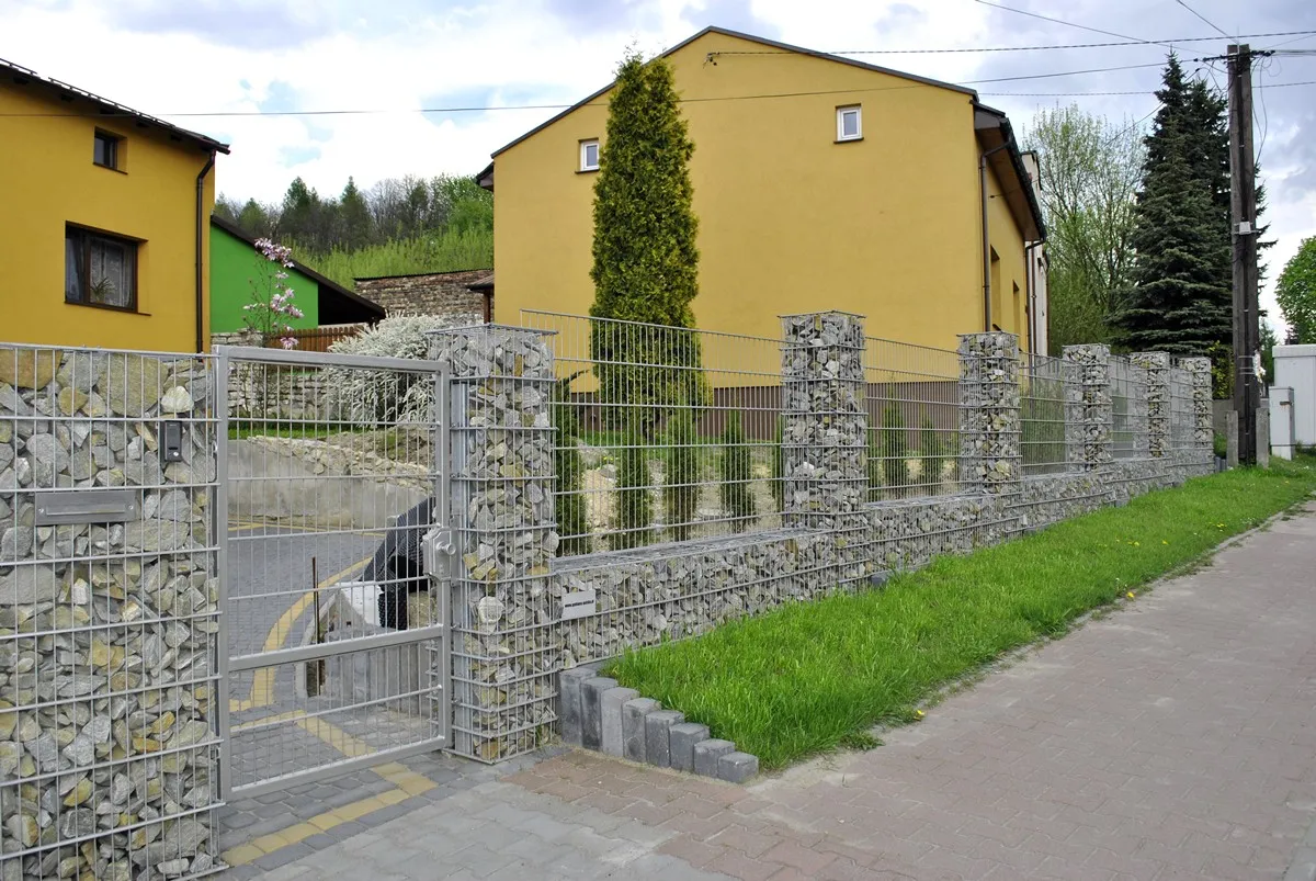 Gabion entrance with pedestrian gate