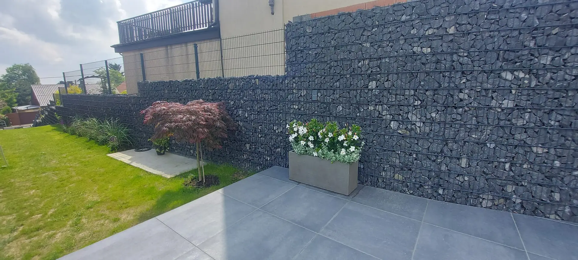 Gabion terrace wall with garden planting